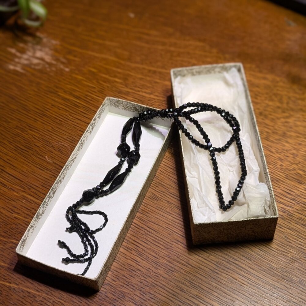 1960s Black Glass Necklace 26 Inches long and 3 1/2 fringe drop